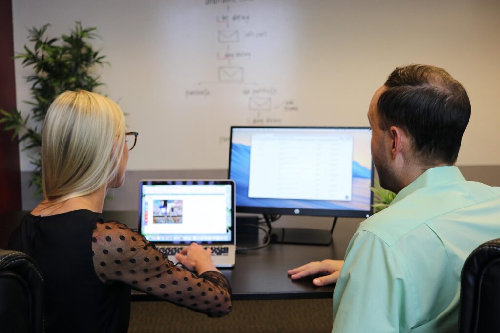 Business professional consulting with a client in a modern office setting